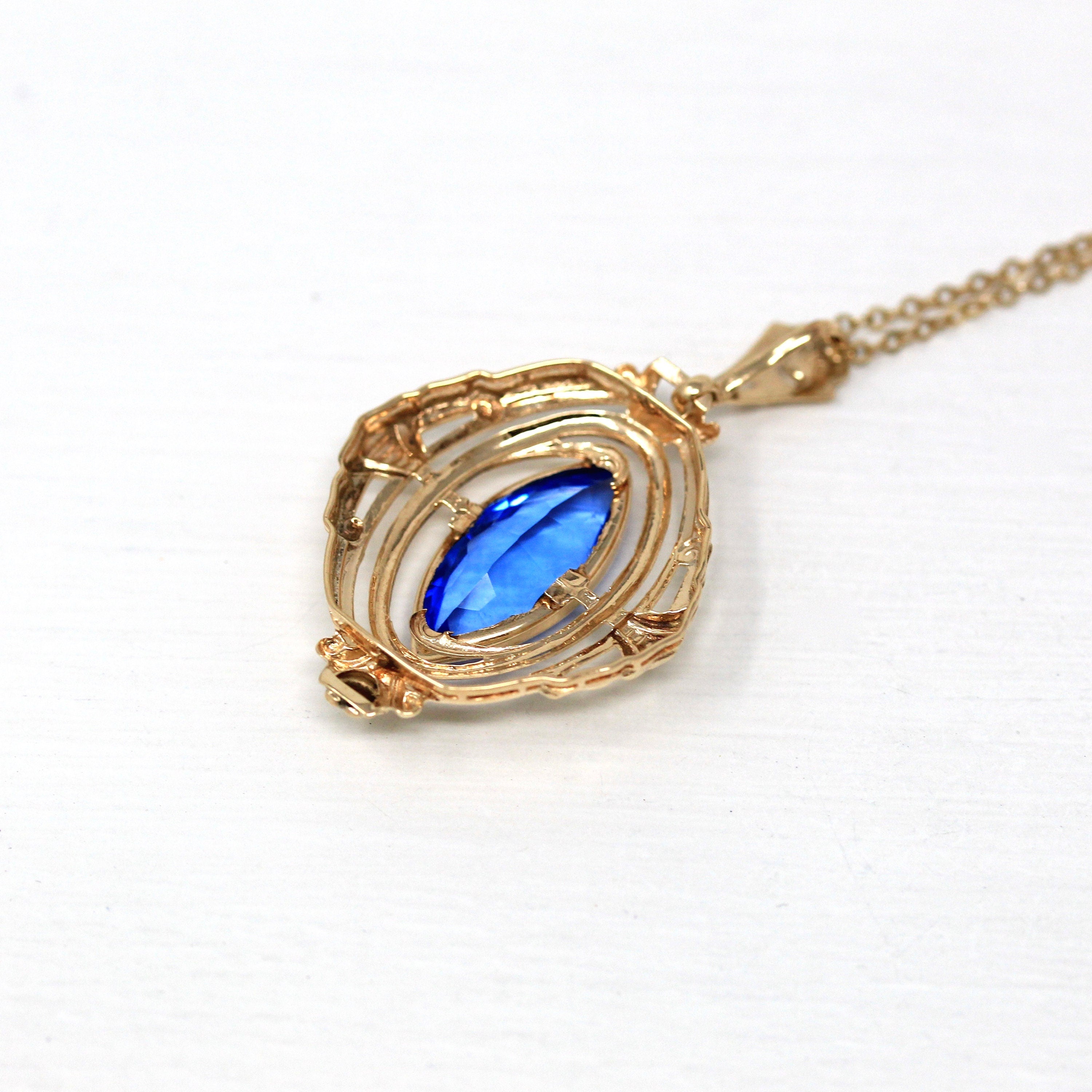 10k-14k gold pendant with blue purchases sapphire