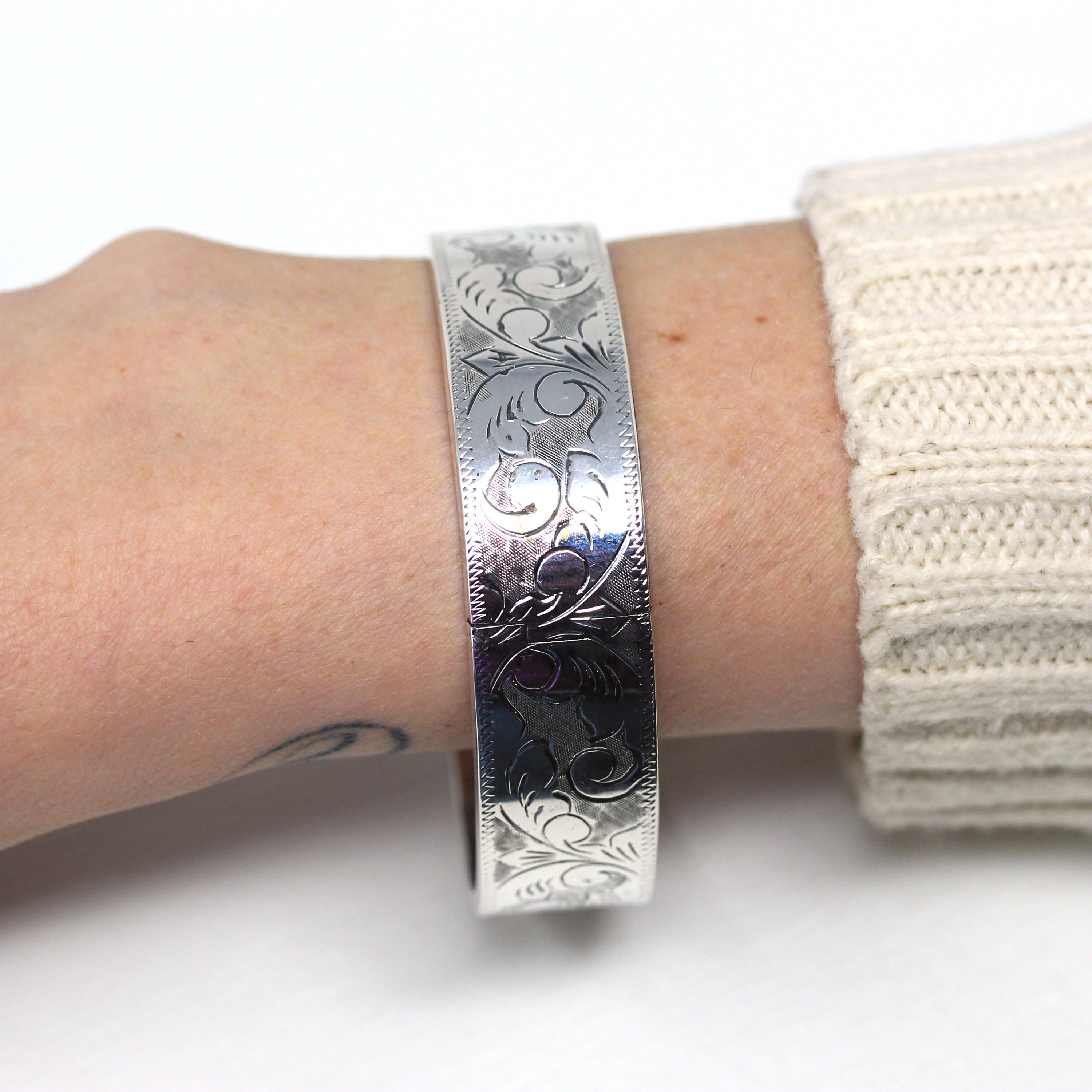 Vintage Silver Engraved Belt Style Bangle. Marked Silver. Floral Leaf Design, 21 grams. Excellent Vintage on sale Condition. Adjustable.